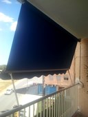 Toldo stor en balcón